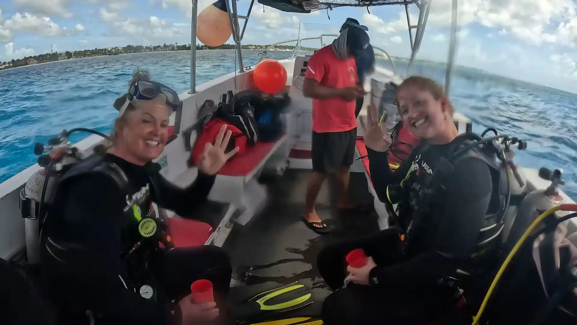 Certified divers ready to do their pre-dive safety check