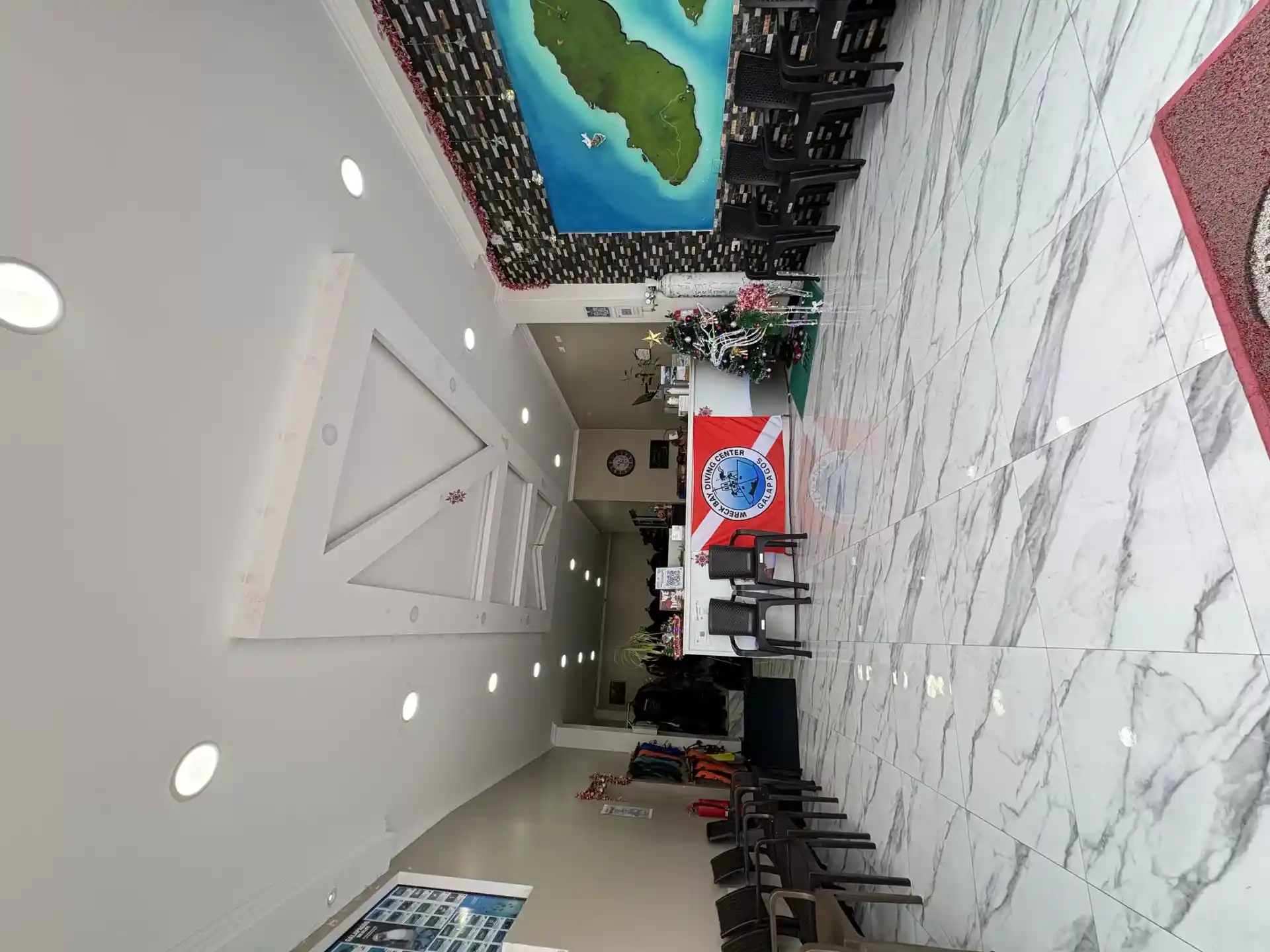 INTERIOR OF OUR DIVING CENTER, RECEPTION POINT AND BRIEFING AREA FOR CLIENTS.