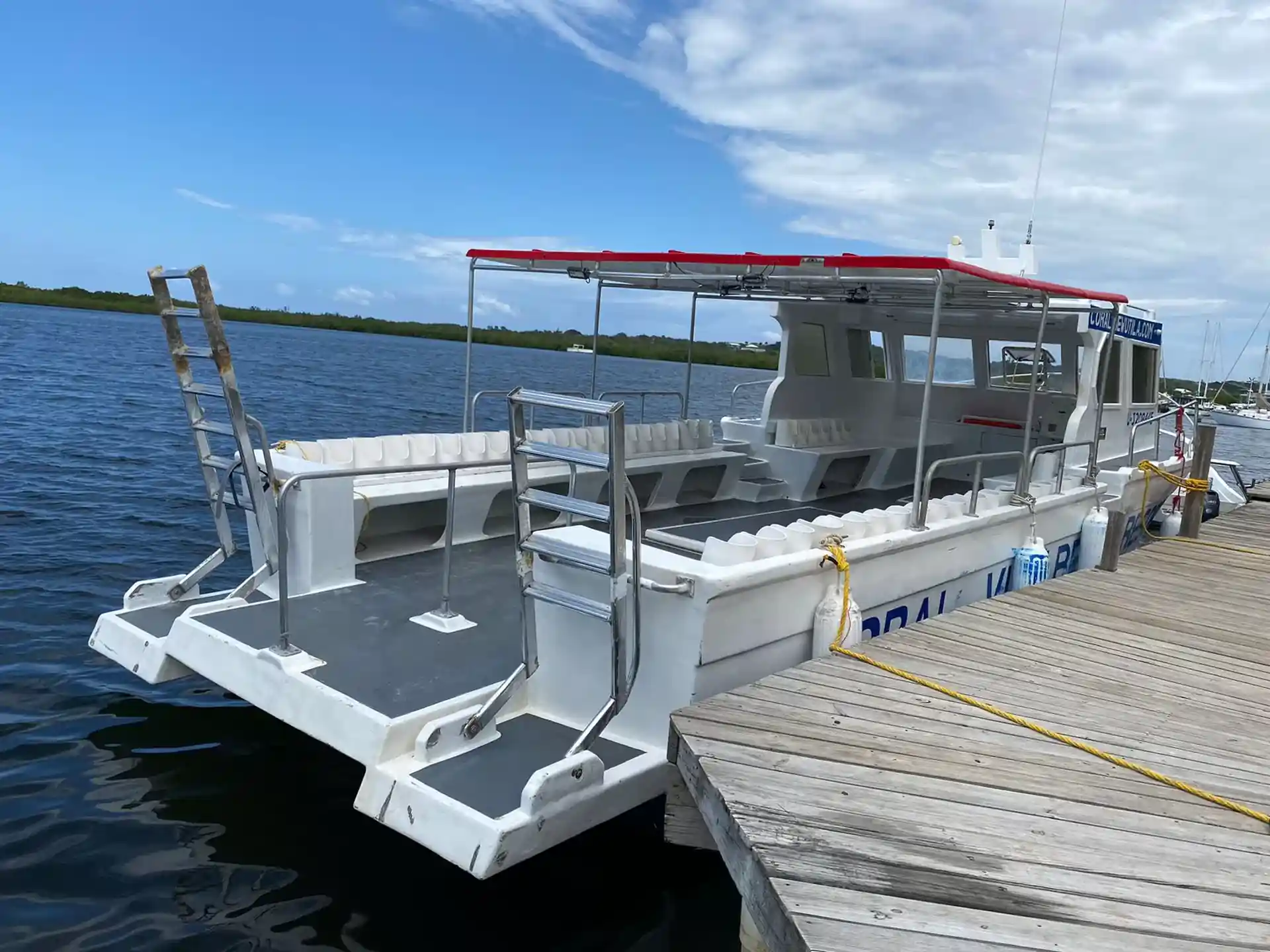 Cozy cabin, panoramic views, dive briefings, camaraderie.