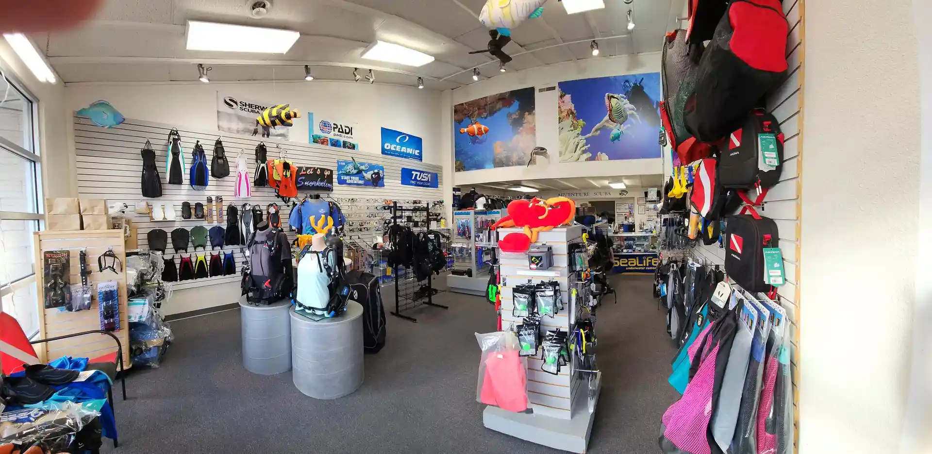 Explore dive gear with us in store.