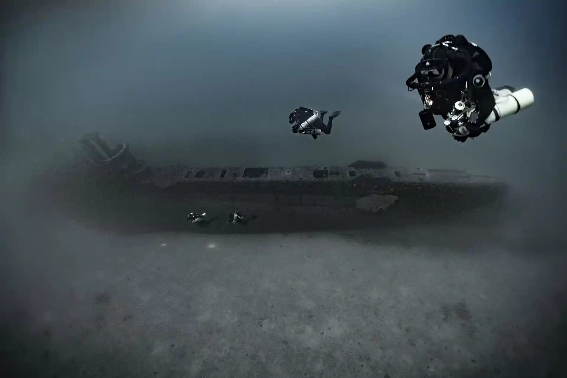 Rebreather diver amongst a wreck