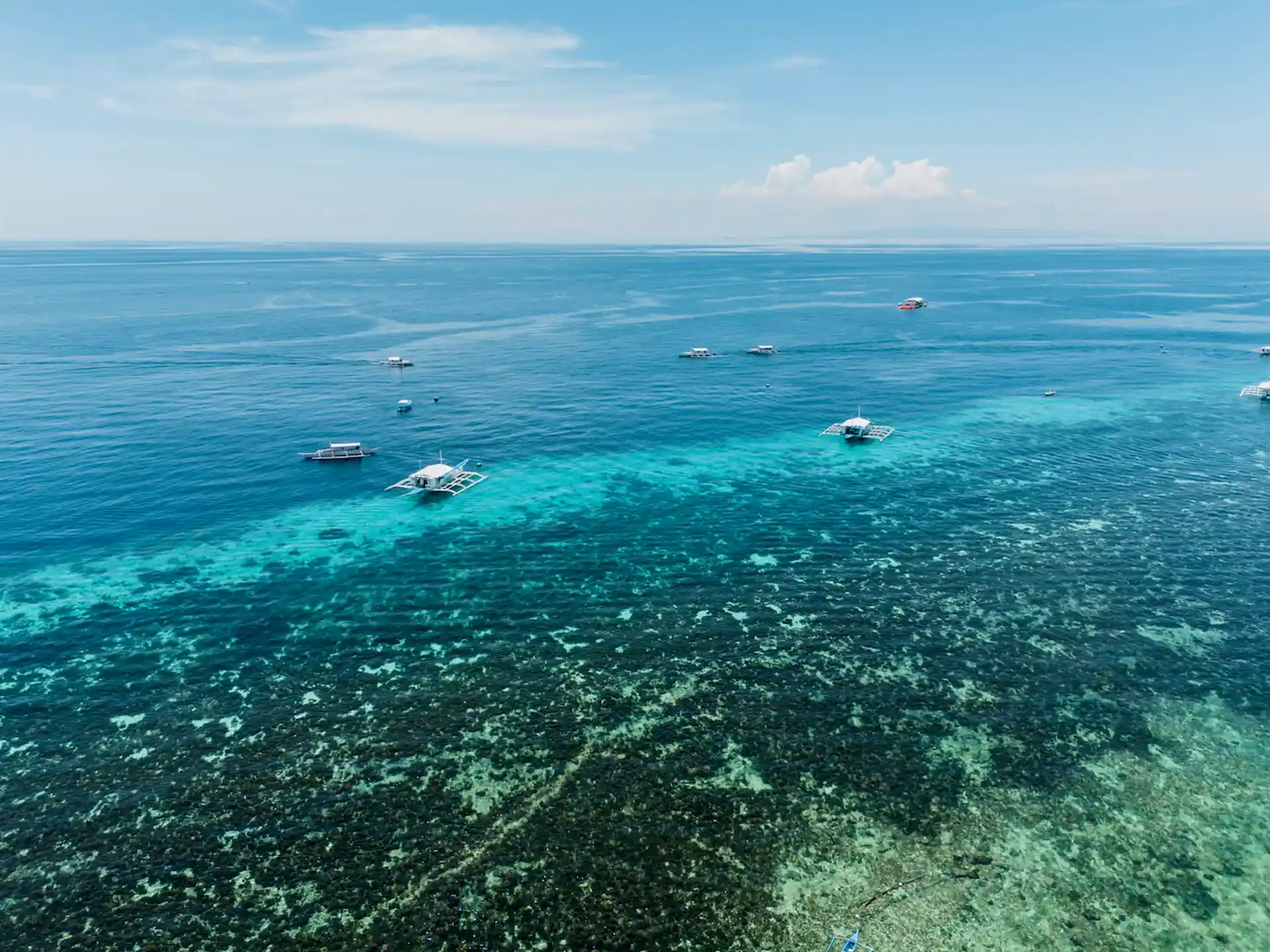 Drone shot of local reefs at Alona Beach, Bohol, Philippines