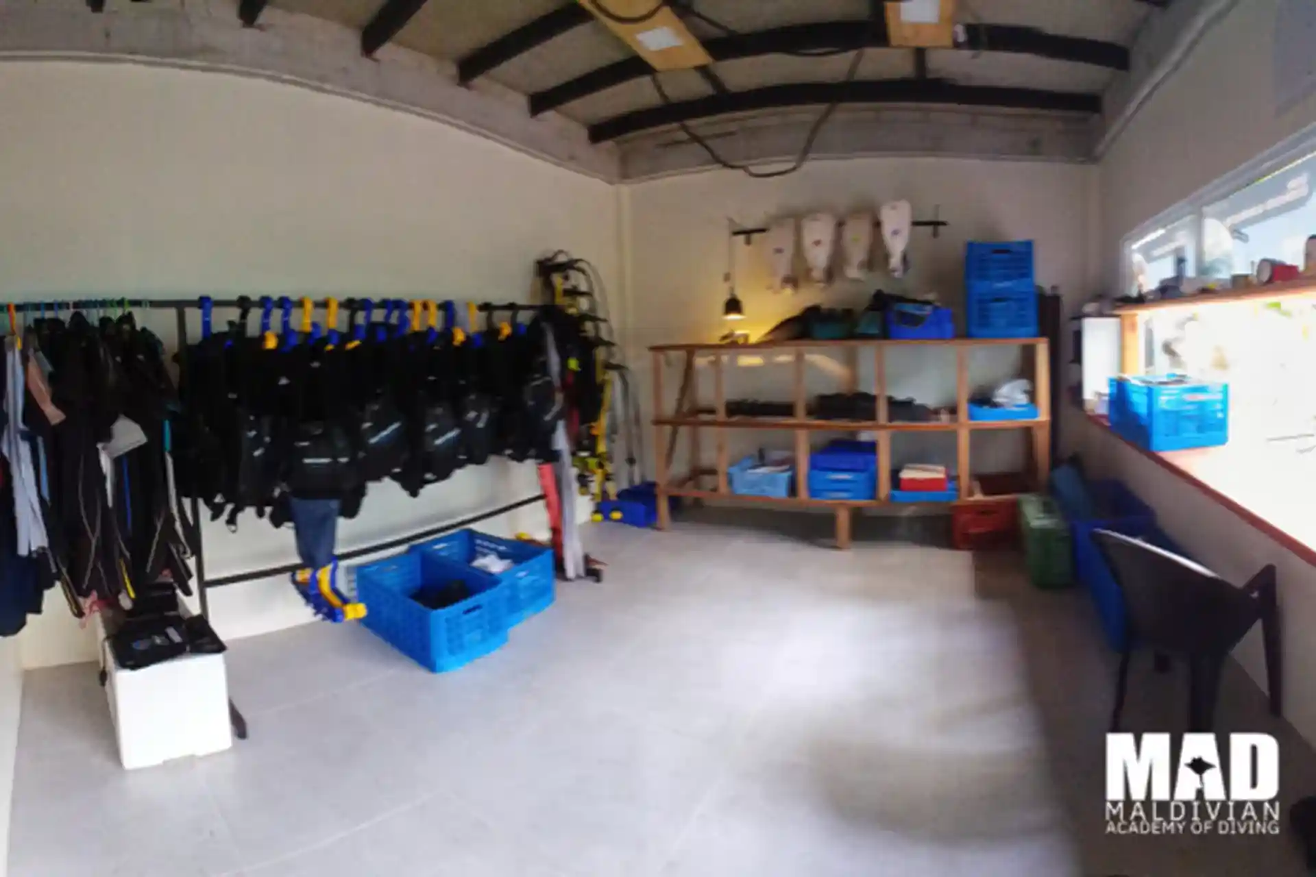 Gear up for adventure! Pick out your scuba gear in our fully stocked equipment room.