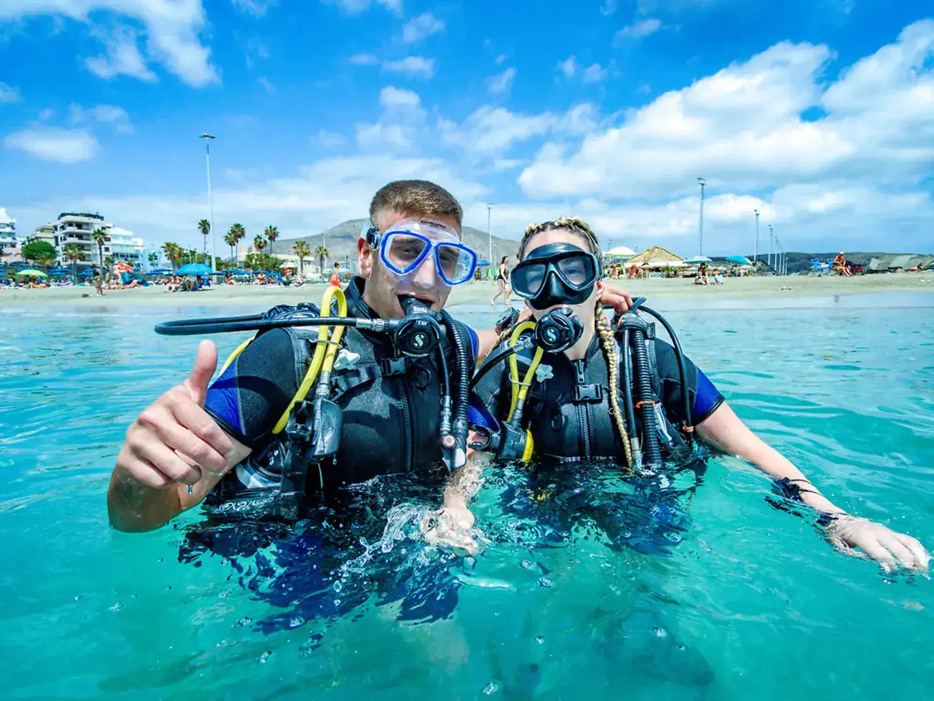 Smiles all around after completing the first open water dive.