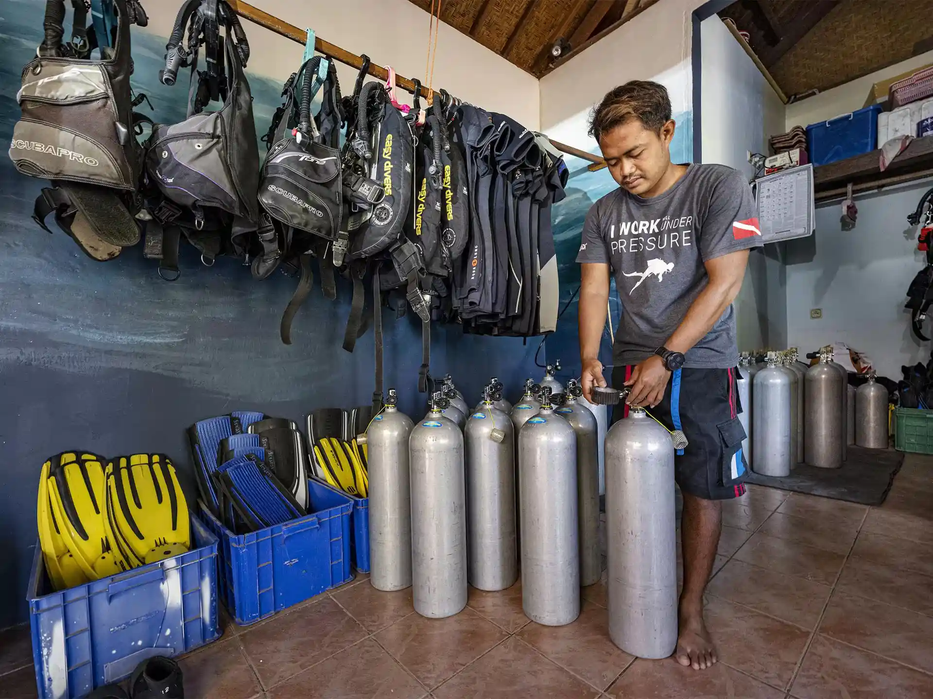Instructor Rafi is checking the air pressure