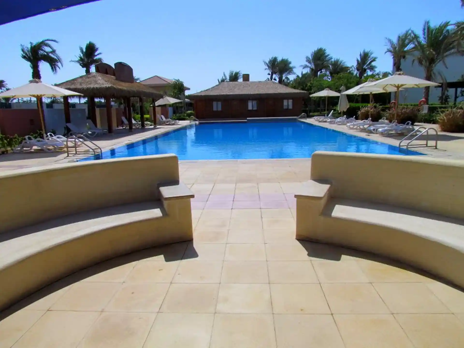 The pool and the dive center in Reef Oasis Blue Bay & SPA in Sharm el Sheikh.