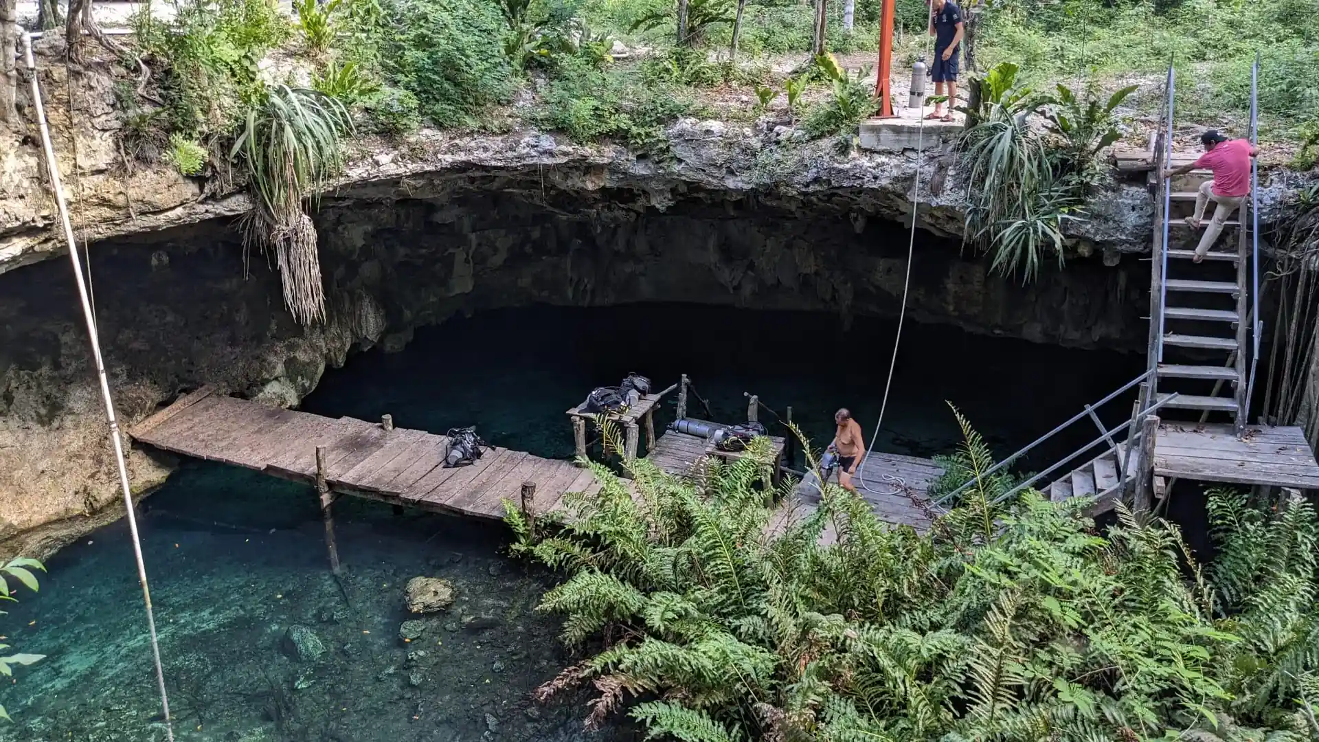 Discover the breathtaking beauty of Dreamgate, a highly decorated cenote filled with fragile stalactites, stalagmites, and intricate formations in narrow, silty passages.