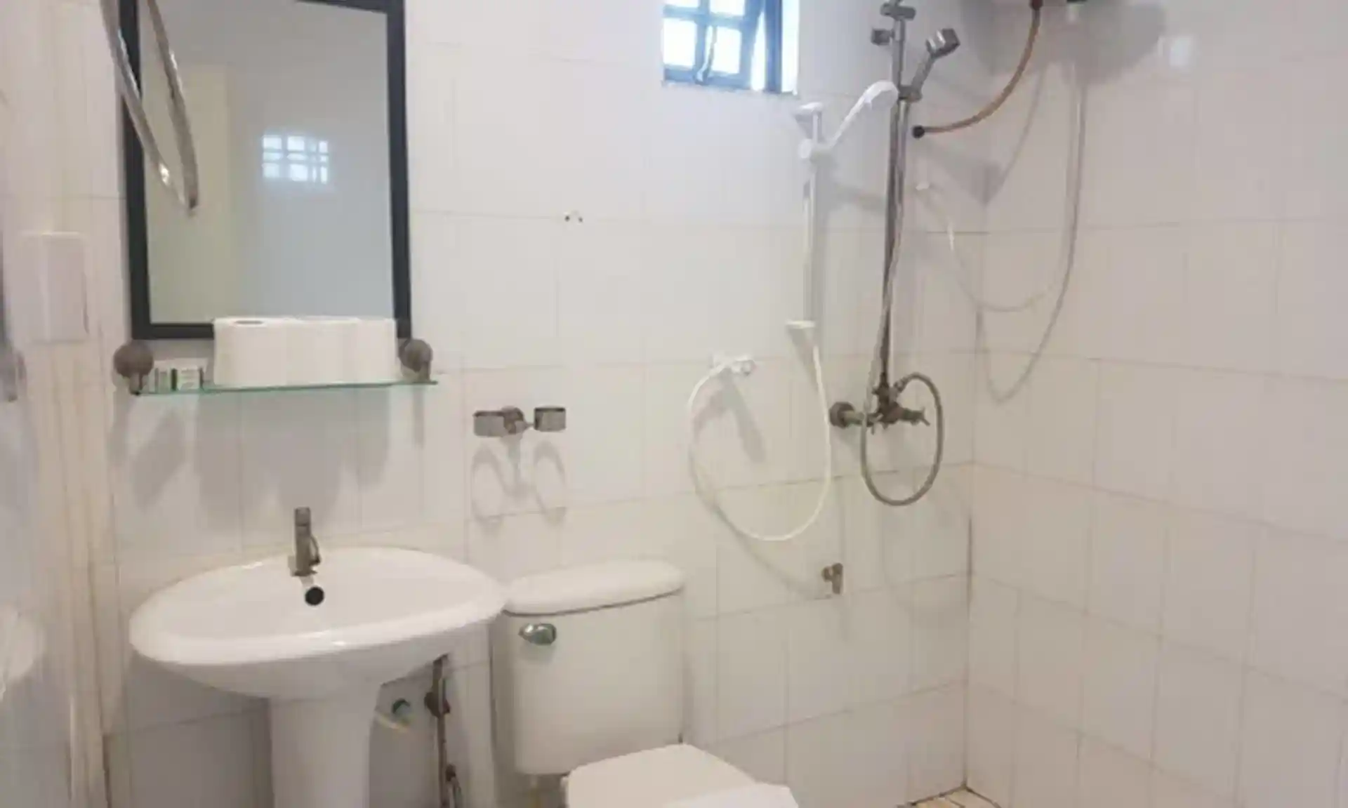 Bathroom with hot water shower and amenities