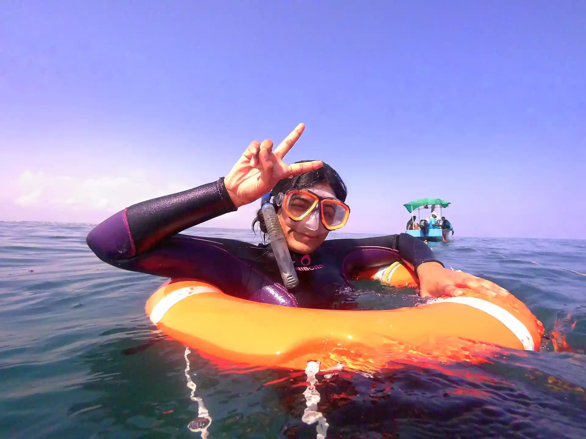 Attached to the boat, safe inside a ring and with a guide at your side - its super safe!