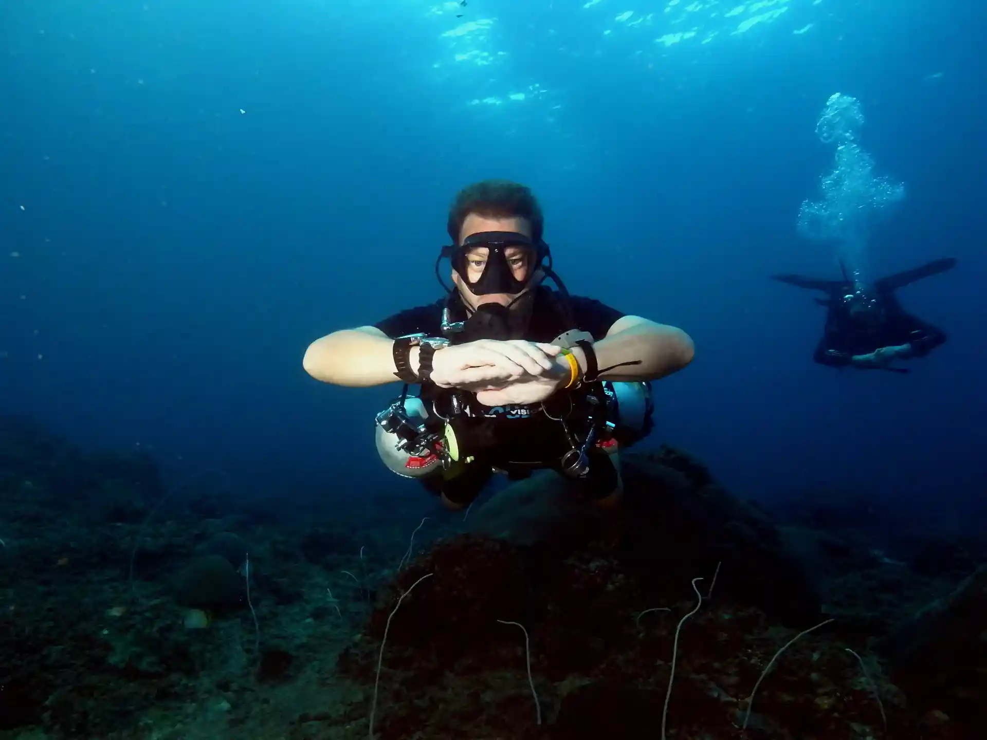 Diver in sidemount configuration