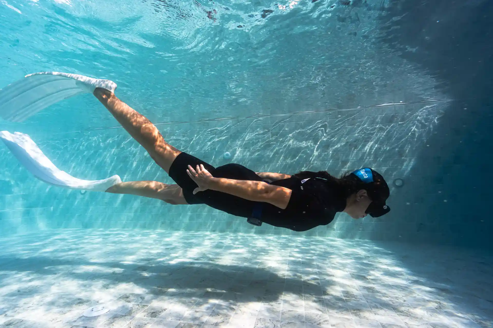 Freediver practising in a pool