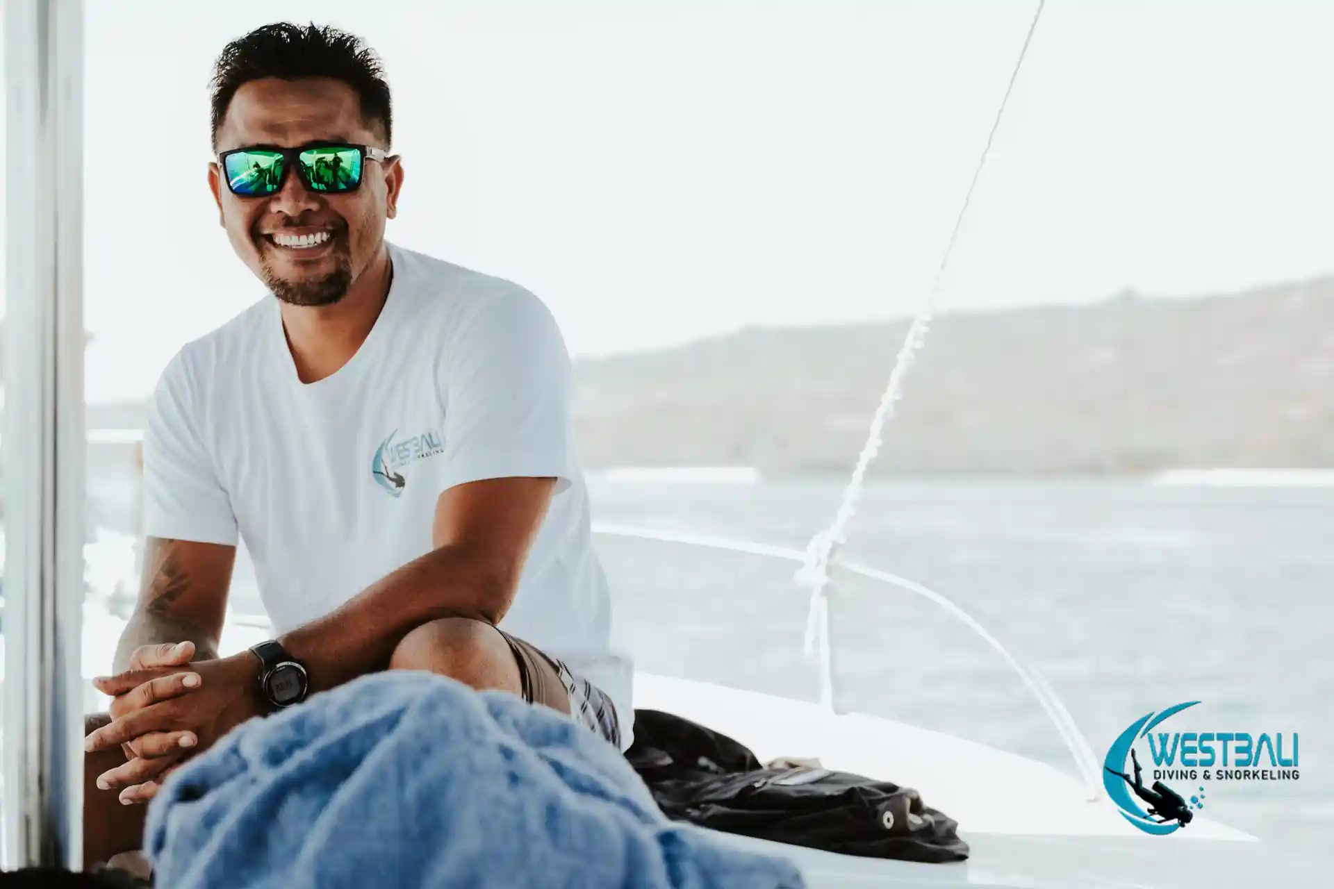 Komang, primary guide, instructor, and owner out on the boat.